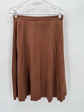 Bagatelle Collection Faux Suede Pleated Midi Skirt in a rich brown tone.